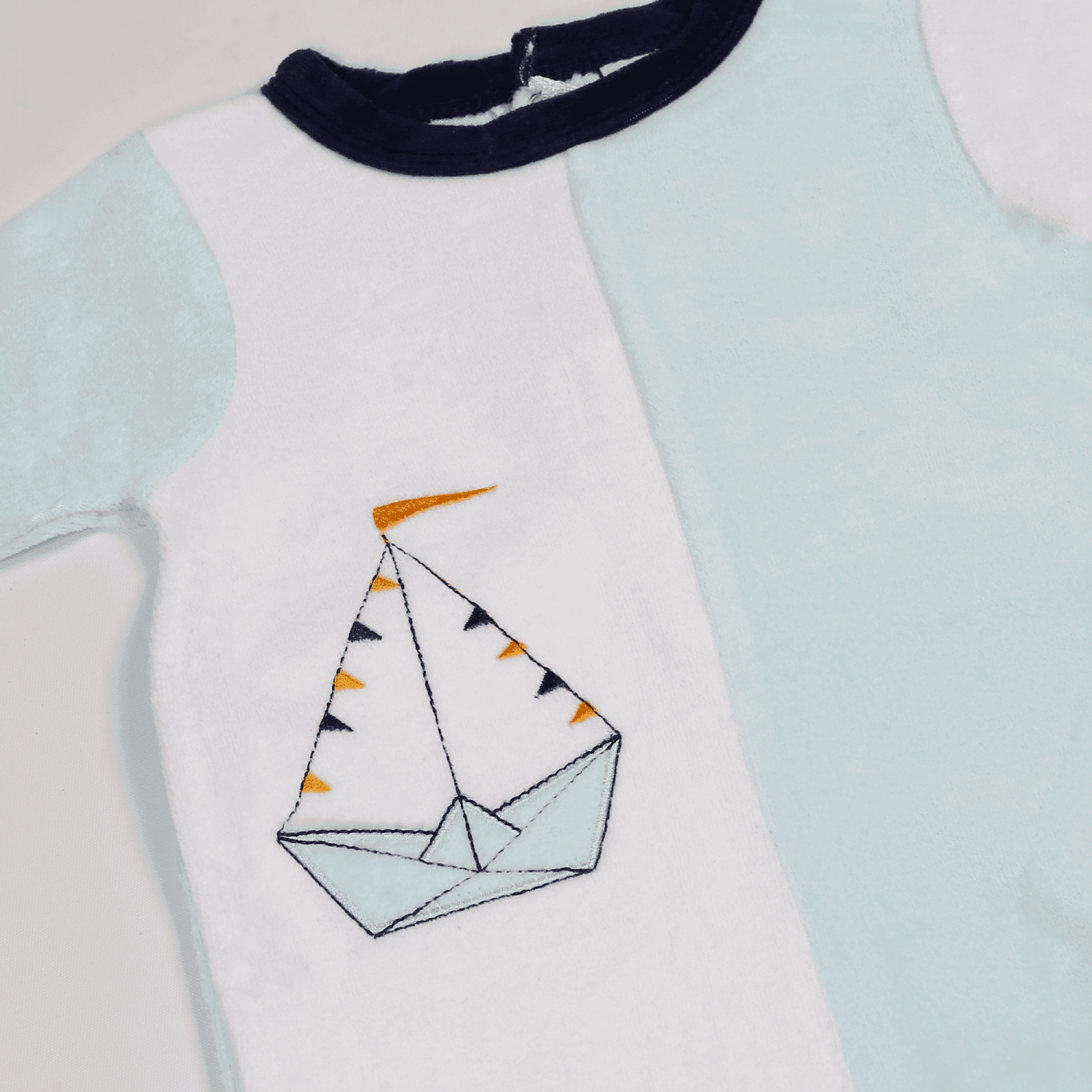 White And Blue Velvet Baby Pyjamas With Boat Embroidery And Back Closure White And Blue Velvet Baby Pyjamas With Boat Embroidery And Back Closure